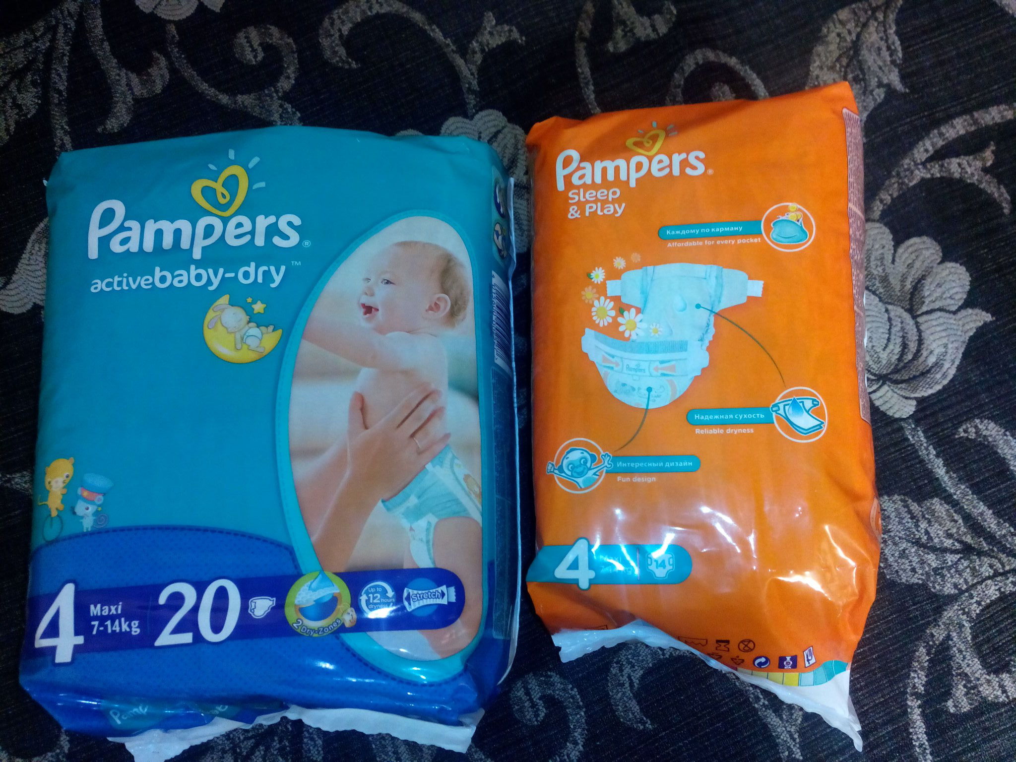 Подгузники оптом от производителя. Подгузники для новорожденных оранжевая упаковка.