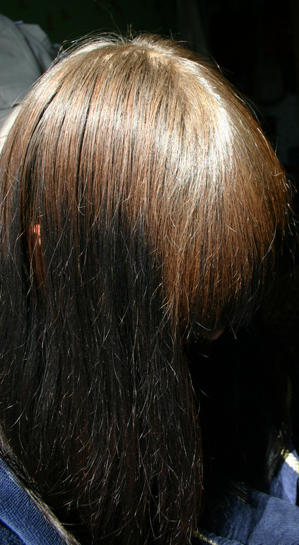 Коричневые волосы после покраски в черный